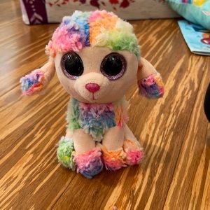 Rainbow poodle plushie